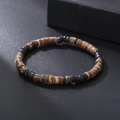 Detailed view of bohemian turquoise and wood bead bracelet on a black textured surface - ZJ11943-Brown and Black Coconut Shell Wood Bracelet