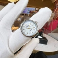Elegant silver quartz ring watch with white pearl dial and golden numerals for women - Silver Number 1