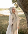 Solid beige pearl chiffon long scarf with a soft drape, styled with a white dress - Off White