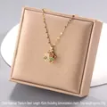 Gold plated titanium steel necklace with colorful zircon flower pendant on jewelry box - Multicolor Flower Style (A1394)