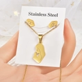 Macro view of gold stainless steel necklace and stud earrings set with prayer pendants - TT-067 (Figure Silhouette)