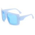 Oversized square sunglasses featuring a light blue translucent frame and bright blue lenses - Jelly Blue