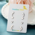 Set di quattro paia di orecchini a lobo in acciaio inox con stelle e luna argento - Set di 4 Paia / Color Acciaio