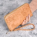 Elegant apricot long wallet for women with floral embossed leather and wristlet strap - Yellow