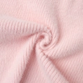Detailed close-up of soft pink faux mink fur fabric with ribbed knit texture and plush feel - S / Pink