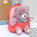 Pink and orange children's backpack featuring a purple plush bear with a blue scarf - Watermelon red