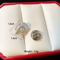 Macro view of silver feather brooch with clear gems, measuring 1.6cm by 1.4cm - Silver Feather C271