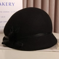 Elegant black wool cloche hat for women featuring a stylish bow and pom-pom accent - M(56-58cm) / Black