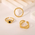 Set of three golden titanium steel rings featuring evil eye and hollow chain designs - J853-Evil Eye Gold 3-Piece Set