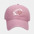 Detailed view of pink washed cotton baseball cap with rugby heart print and curved brim - Adjustable / Pink