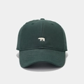 Close-up of a dark green cotton baseball cap featuring white polar bear embroidery - Adjustable / Dark Green
