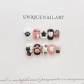 Detailed view of handmade pink and black press-on nails with 3D cat and paw relief art - Extra Small (XS) / 1557 Short Coffin Style (1557)