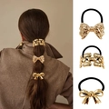 Three-piece punk style gold hair rings set with metal bow and chain charms on models - Set 4 (3Pcs Bow & Chain Design)