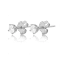 Macro shot of 925 sterling silver stud earrings with sparkling cubic zirconia in prong setting - Minimalist Single Zirconia Stud-Silver