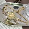 Elegant gold heart-shaped quartz watch with rhinestones and light brown gemstone accents - Gold Gold