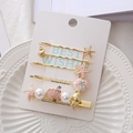 Set de pinzas doradas con estrella de mar, caracola, esmalte rosa y perlas mujer - Juego de Joyas Rosa