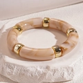 Macro detail of acrylic leopard marble link bracelet with polished gold metal spacers - Bracelet-Creamy White Marble