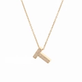 Detailed close-up of golden T-letter pendant necklace with sparkling micro-pave zircons - Letter T