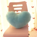 Light blue heart shaped plush pillow cushion on a pink chair for modern home decoration - Pale Blue Heart