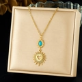 Gold stainless steel necklace featuring turquoise sun and hollow heart pendant on a pad - Necklace (N3864)