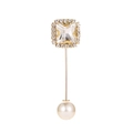 Elegant gold-tone safety pin brooch with square crystal and white pearl accent - Gold White