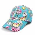 Close-up of blue floral baseball cap showing canvas texture and detailed flower print - Adjustable / Cyan Blue
