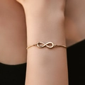 Adjustable gold plated infinity bracelet with zircon stones and minimalist design - Infinity Style (KB0589)
