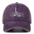 Close-up of vintage washed purple baseball cap with hands embroidery and distressed finish - Purple