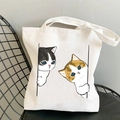 White canvas tote bag with cute cartoon cat print and reinforced shoulder straps - Two Cats Peeking