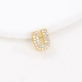 Macro shot of gold letter U pendant with micro-pave sparkling cubic zirconia stones - U (Single Pendant)