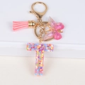 Pink sequined resin letter T keychain with glitter butterfly and tassel pendant charm - Letter T