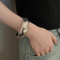Detail of silver wide cuff bracelet with crocodile texture on a female model wrist - Crocodile Skin Texture Style (9#)
