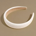 Macro shot of white straw woven texture and light brown inner lining on the headband - Off White