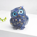 Cute owl figurine crafted from blue crystal resin with gold flecks on white display base - Lapis Lazuli + Gold Foil