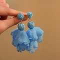 Detailed view of blue raffia and chiffon flower petal bohemian drop earrings - Style 4 (Steel Pin) / Blue