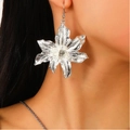 Silver textured leaf-shaped earrings with a central rhinestone shown on a model - Bright Silver Leaf Rhinestone Earrings (Z-070)