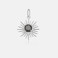 Macro view of S925 silver sunburst pendant with a round black gemstone in the center - White Gold-Sun