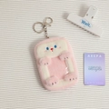 Close-up of pink and white plush card holder with soft texture and metal keychain - Pink Toast