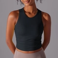 Close-up of black backless yoga vest with high neck and matte slim-fit athletic fabric - S / Black