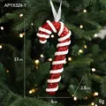 Red and white glitter candy cane ornament with ribbon hanging on a Christmas tree - Cane Style A (6g)