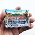 Detailed hand-held view of a 3D resin Florence Ponte Vecchio stamp fridge magnet souvenir - Ponte Vecchio Stamp