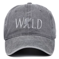 Detailed close-up of WILD embroidery with Bigfoot silhouette on washed grey cotton cap - Adjustable / Gray