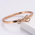 Bracciale a fiocco oro rosa con cristalli su supporto, elegante gioiello regalo festivo - Oro rosa