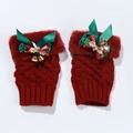 Detail of red knitted fingerless gloves with bow, golden bells and faux fur trim - One Size / Wine Red Gloves