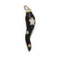 Macro view of black enamel chili charm with gold star inlay and polished metal finish - Black Star Chili