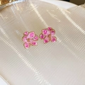 Close-up of pink oil-dripped flower earrings with golden edges and metal stamen details - Pink Enamel Flower Stud Earrings (Silver Pin)