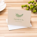 Beige floral greeting card with fern pattern and white envelope on wooden desk - Especially For You / With Envelope