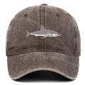 Detail of shark embroidery and washed cotton texture on vintage brown baseball cap - Coffee