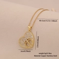 Gold heart pendant necklace with baby footprints cutout and zircon inlays on beige fabric - Baby Footprint Hollow Heart Style (7#)