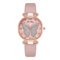 Close-up of pink fashion watch featuring a glitter butterfly pattern and rose gold case - Pink